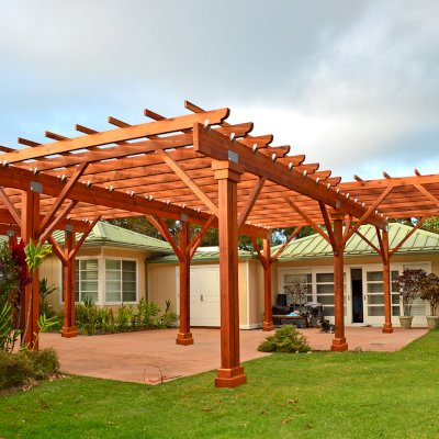 Custom Wooden Pergola (Options: 39' x 50', Mature Redwood, 3 1/8" x 15" Glulam Beams/Supports, 3 3/4" x 7 1/4" Rafters and 1 3/4" x 3 3/4" Slats, Double 5 /12" x 5 1/2" x 10' Posts, Custom Post Anchors, Transparent Premium Sealant). Photo Courtesy of D. Cole of Maui, Hawaii.