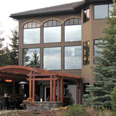 Custom Wooden Pergola (Options: 24' x 22', California Redwood, Open Roof with Rafters at 15", 9' Post Height [Front Posts 2' Shorter], Transparent Premium Sealant). Photo Courtesy of Kelly Fraser of Okotoks, AB, Canada.