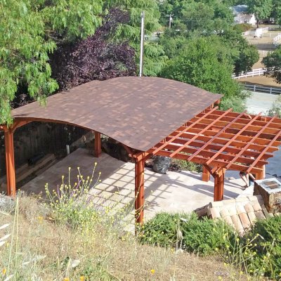 Custom Wooden Pergola with Pavilion (Options: Mature Redwood with Pavilion Ceiling in Old-Growth Redwood, with 2 Fan Bases, Electrical Wiring Trim Kit for 1 Post, 6-Post Anchor Kit for High-Wind, Transparent Premium Sealant). Backyard Pavilion is sized 18 x 18 ft and Garden Pergola is 9 x 14 ft. Yes, you can mix and match different pergola and pavilions in almost any size and configuration to make the perfect shade structure for your yard. Photo Courtesy of Joan Angwin of Morgan Hill, CA.