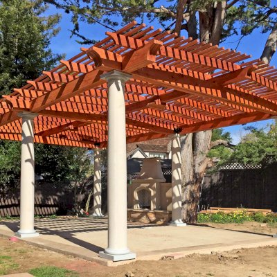 Custom Wooden Pergola (Options: 19' x 32', Mature Redwood, 4-Post Anchor Kit for High-Wind, Trasnparent Premium Sealant). Customer Placed Tuscan Columns Around the Pergola Posts. Photo Courtesy of M. McCook of San Mateo, CA.