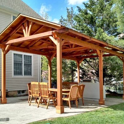Del Norte Outdoor Kitchen Pavilion (Options: 25' L x 14' W, California Redwood, 6-Post Anchor Kit for High-Wind, 2 Ceiling Fan Bases, No Electrical Wiring Trim Kit, No Post Decorative Trim, Transparent Premium Sealant). Photo Courtesy of D. Meekings of Scotch Plains, New Jersey.
