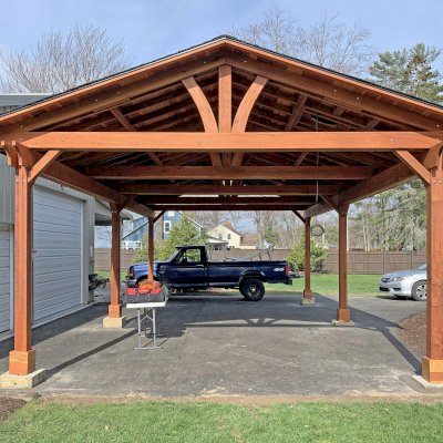 Del Norte Outdoor Kitchen Pavilion (Options: 30' L x 18' W, California Redwood, 6-Post Anchor Kit for Concrete, 9.5' H Posts, 4 Ceiling Fan Bases, 2 Fascia Boards, Transparent Premium Sealant). Photo Courtesy of J. Kimmel of Constantia, New York.