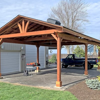 Del Norte Outdoor Kitchen Pavilion (Options: 30' L x 18' W, California Redwood, 6-Post Anchor Kit for Concrete, 9.5' H Posts, 4 Ceiling Fan Bases, 2 Fascia Boards, Transparent Premium Sealant). Photo Courtesy of J. Kimmel of Constantia, New York.