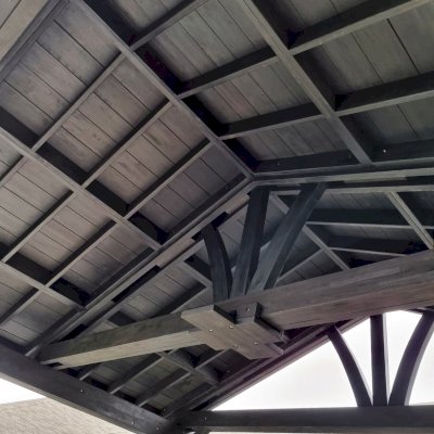 Del Norte Outdoor Kitchen Pavilion (Options: 16' L x 20' W, Mosaic Redwood, No Privacy Panel, 4-Post Anchor Kit for Concrete, 11' H Posts, 1 Ceiling Fan Base, No Curtain Rod, Black Stain Premium Sealant). Photo Courtesy of J. Miller of Brownsburg, Indiana.