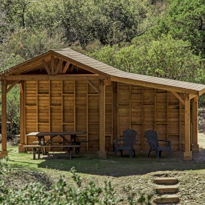 Custom Del Norte Outdoor Kitchen Pavilion (Options: 12' L x 12' W, with 9' x 12' Shed Pavilion Attached, Douglas-fir, 6-Post Anchor Kit for High-Wind, No Ceiling Fan Base, No Electrical Wiring Trim Kit, No Post Decorative Trims, with Custom Solid Wall, Transparent Premium Sealant). Photo Courtesy of J. Randall of Warner Springs, CA.