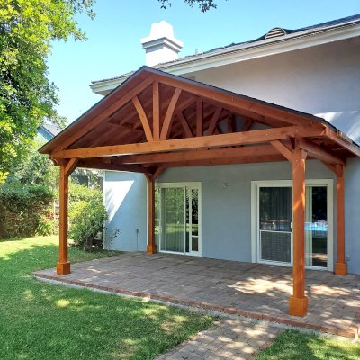 Del Norte Outdoor Kitchen Pavilion (Options: 12' L x 20' W, Douglas-fir, No Privacy Panel, 4-Post Anchor Kit for Concrete, 10' H Posts, No Ceiling Fan Base, No Curtain Rod, No Fascia Boards, Transparent Premium Sealant). Photo Courtesy of L. Russell of Pasadena, CA.
