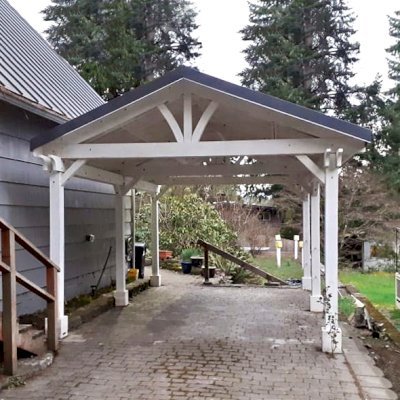 Del Norte Outdoor Kitchen Pavilion (Options: 22' L x 14' W, Mosaic Redwood, 6-Post Anchor Kit for High-Wind, No Ceiling Fan Base, No Electrical Wiring Trim Kit, No Post Decorative Trims, White Primer). Charcoal Gray Metal Roof Installed by Forever Redwood by Custom Request. Photo Courtesy of N. Niekerson of Shoreline, Washington.