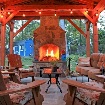 Custom Del Norte Outdoor Kitchen Pavilion (Options: 25' L x 14' W, Douglas-fir, 8-Post Anchor Kit for Concrete, 2 Ceiling Fan Base, 2 Electrical Wiring Trim Kits, No Post Decorative Trims, Transparent Premium Sealant). Photo Courtesy of A. Lotwin of Potomac, Maryland.