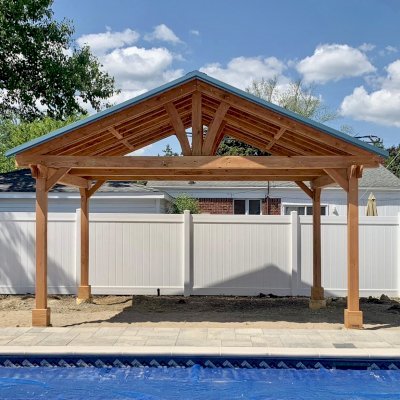 Del Norte Outdoor Kitchen Pavilion (Options: 12' L x 18' W, Douglas-fir, 4-Post Anchor Kit for High-Wind, With 2 Ceiling Fan Base, Electrical Wiring Trim Kit for 2 Posts, Transparent Premium Sealant). Metal Roof Installed by Customer. Photo courtesy of S. Bono of Royal Oak, Michigan.