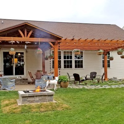Del Norte Outdoor Kitchen Pavilion (Options: 18' L x 14' W, California Redwood, 6-Post Anchor Kit for High-Wind, No Ceiling Fan Bases, No Electrical Wiring Trim Kits, No Privacy Panels, No Post Decorative Trims, Transparent Premium Sealant). Garden Pergola Attached to the Pavilion. Photo Courtesy of T. Lee of Noblesville, Indiana.