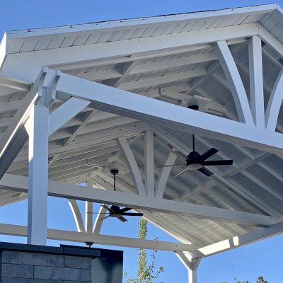 Del Norte Outdoor Kitchen Pavilion (Options: 20' L x 20' W, Douglas-fir, 4-Post Anchor Kit for High-Wind, 2 Fascia Boards, 2 Ceiling Fan Bases, 1 Electrical Wiring Trim Kit, No Post Decorative Trims, Off-White Oil-Based Primer). Photo Courtesy of R. Brooks of Reno, NV.