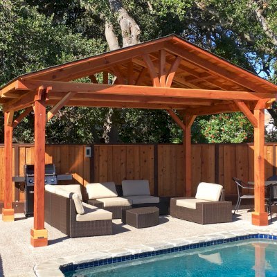 Del Norte Outdoor Kitchen Pavilion (Options: 11' L x 17' W, California Redwood, 4-Post Anchor Kit for Concrete, No Ceiling Fan Base, Transparent Premium Sealant). Roofing was still pending when shots taken just after assembly. Photo Courtesy of D. McCracken of Millbrae, CA.