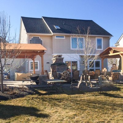 Del Norte Outdoor Kitchen Pavilion (Options: 14' L x 14' W, Douglas-fir, Posts Sitting Atop 33" H Load Bearing Columns, Posts Anchor Kit for Concrete, Transparent Premium Sealant). Photo Courtesy of Michael L. of S. Lyon, Michigan.