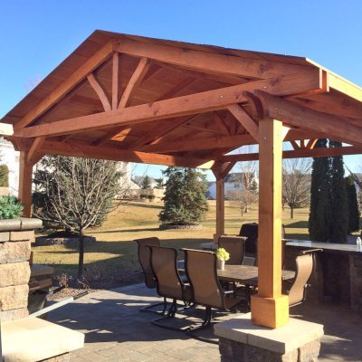 Del Norte Outdoor Kitchen Pavilion (Options: 14' L x 14' W, Douglas-fir, Posts Sitting Atop 33" H Load Bearing Columns, 4-Post Anchor Kit for Concrete, Transparent Premium Sealant). Photo Courtesy of Michael L. of S. Lyon, Michigan.
