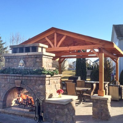 Del Norte Outdoor Kitchen Pavilion (Options: 14' L x 14' W, Douglas-fir, Posts Sitting Atop 33" H Load Bearing Columns, 4-Post Anchor Kit for Concrete, Transparent Premium Sealant). Photo Courtesy of Michael L. of S. Lyon, Michigan.