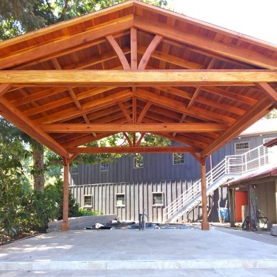 Del Norte Outdoor Kitchen Pavilion (Options: 20' L x 18' W, California Redwood, 4-Post Kit for High-Wind, No Ceiling Fan Base, No Electrical Wiring Trim Kit, Transparent Premium Sealant). Photo Courtesy of N. Littleton of Sherwood, OR.