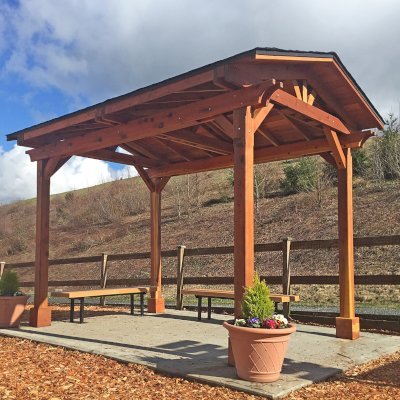 Del Norte Outdoor Kitchen Pavilion (Options: 14' L x 10' W, California Redwood, 4-Post Anchor Kit for High-Wind, No Ceiling Fan Base, Transparent Premium Sealant). Photo Courtesy of J. Dorsey of Issaquah, WA.