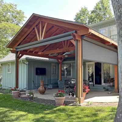 Del Norte Outdoor Kitchen Pavilion (Options: 18' L x 16' W, California Redwood, Transparent Premium Sealant). If you are interested in the custom retractable side shade canopies shown, they can be added to your order upon request.