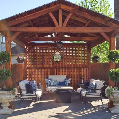 Del Norte Outdoor Kitchen Pavilion (Options: 14' L x 14' W, California Redwood, Unattached, 4-Post Anchor Kit for Concrete, Electrical Wiring Trim for 1 Post, 9' Posts, No Ceiling Fan Base, 2 Custom Privacy Panels, No Curtain Rods, Transparent Premium Sealant). Photo Courtesy of Michael Walti of Hillsboro, Oregon.