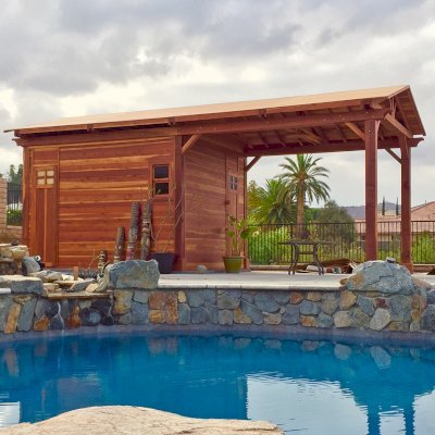 Custom Del Norte Outdoor Kitchen Pavilion with enclosed bathroom and front "porch area" (Options: 28' L x 14' W, California Redwood, 6-Post Anchor Kit for High-Wind, No Ceiling Fan Base, Electrical Wiring Trim Kit for 1 Post, Transparent Premium Sealant). Photo Courtesy of C. Nelson of Riverside, CA. Final roofing skin (composite shingles) was added a few days after these pictures were taken.
