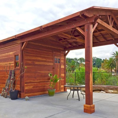 Custom Del Norte Outdoor Kitchen Pavilion with enclosed bathroom and front "porch area" (Options: 28' L x 14' W, California Redwood, 6-Post Anchor Kit for High-Wind, No Ceiling Fan Base, Electrical Wiring Trim Kit for 1 Post, Transparent Premium Sealant). Photo Courtesy of C. Nelson of Riverside, CA. Final roofing skin (composite shingles) was added a few days after these pictures were taken.