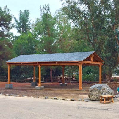 Del Norte Outdoor Kitchen Pavilion (Options: 40' L x 20' W, Douglas-fir, 6-Post Anchor Kit for High-Wind, With 2 Ceiling Fan Base, Electrical Wiring Trim Kit for 1 Post, Transparent Premium Sealant). Installed in Jewish Big Brothers and Sisters Campground in Glendale, CA.