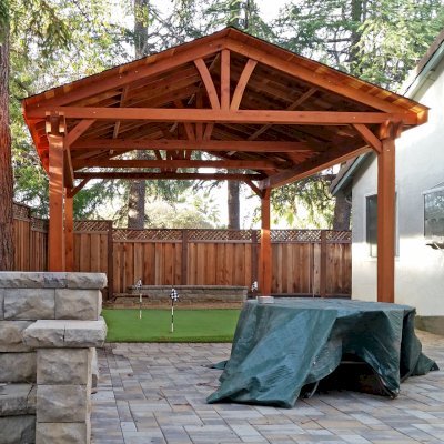 Del Norte Outdoor Kitchen Pavilion (Options: 26' L x 18' W, California Redwood, 4-Post Anchor Kit for High-Wind, 1 Ceiling Fan Base, Transparent Premium Sealant). Photo Courtesy of Scott Carper of San Jose, CA.