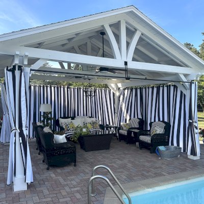 Del Norte Outdoor Kitchen Pavilion (Options: 15' L x 18' W, Mosaic Douglas-Fir, 4-Post Anchor Kit for Concrete, 9.5' H Posts, 1 Ceiling Fan Base, 1 Electrical Wiring Trim Kit, 4 Curtain Rods, White Stain Premium Sealant). Photo Courtesy of S. Leonard of Easton, MA.