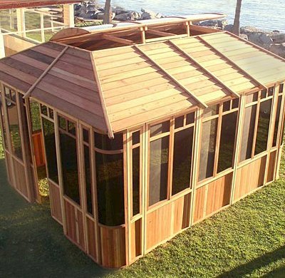 DIY Wood Gazebo (14' L, 12' W, California Redwood, Sliding Windows, 4' x 6' Skylight, 24" H Siding Below Windows, Vertical Siding, Japanese Doors, No Flooring, Transparent Premium Sealant). Custom detail: Roof overhang was minimized per customer request.