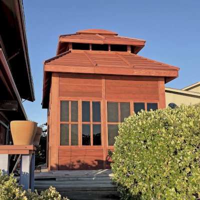 Dream Gazebos (Options: 9 ft Wall Height, 10' L, 14' W, Douglas-fir, All Sliding Windows with Screens, 4' x 6' Skylight, 36" H Siding Below Windows, Horizontal Siding, Japanese Doors with Screens, Complete Floor, Shiplap Roof, Cherry Stain Premium Sealant). Photo Courtesy of B. Victor of Larkspur, California.