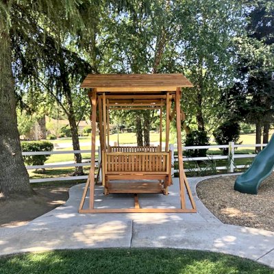 Dustin's Face to Face Gliders (Options: Douglas-fir, Standard Roof, Without Beverage Armrest, No Kid's Platform, Custom Engraving, Transparent Premium Sealant). Photo Courtesy of Gary & Kathy Dei Rossi of Manteca, CA..