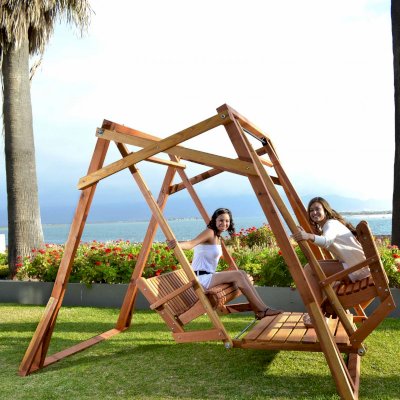 Dustin's Face to Face Gliders (Options: California Redwood, No Roof, Without Beverage Armrest, No Kid's Platform, No Engraving, Transparent Premium Sealant). Photo Courtesy  of Estero Beach Resort, Ensenada, México. 
