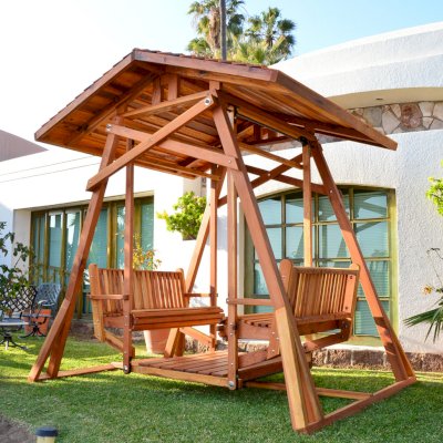 Dustin's Face to Face Gliders (Options: California Redwood, XW Roof, Without Beverage Armrest, No Kid's Platform, No Engraving, Transparent Premium Sealant). Photo Courtesy of El Estero Beach Resort of Ensenada, Baja. 