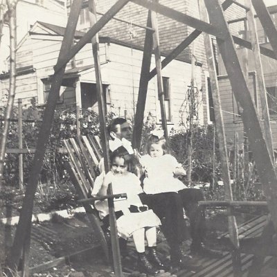 Gary & Kathy Dei Rossi, purchased a face to face swing from Forever Redwood in 2020. They shared this family photo taken in 1915 of Kathy's grandfather Mr. William Hasselbrock and his daughters in their back yard in San Francisco. Face to Face Gliders have a long history and as you can see, the design has changed little over the centuries…