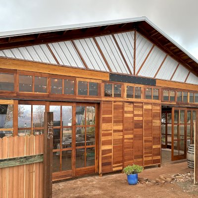 Custom El Paso Wedding Pavilion (Options: 50' L x 45' 6" W, California Redwood, 12' H Posts, 8-Post Anchor Kit for High-Wind, Transparent Premium Sealant). Custom sliding french doors and windows to enclose the structure were added by Forever Redwood during the design process. Photos Courtesy of T. Bruge of The Skyranch Lodge of Sedona, AZ.