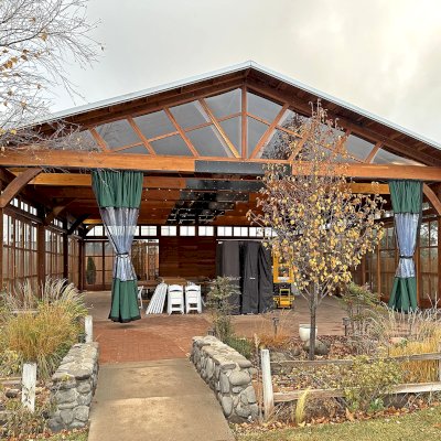 Custom El Paso Wedding Pavilion (Options: 50' L x 45' 6" W, California Redwood, 12' H Posts, 8-Post Anchor Kit for High-Wind, Transparent Premium Sealant). Custom sliding french doors and windows to enclose the structure were added by Forever Redwood during the design process. Photos Courtesy of T. Bruge of The Skyranch Lodge of Sedona, AZ.