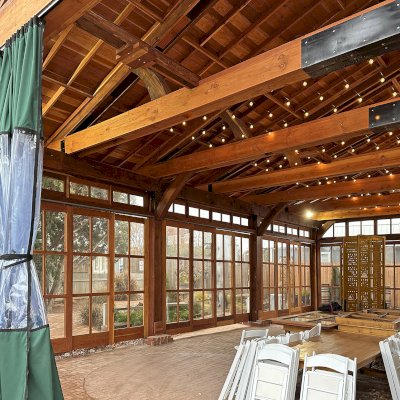 Custom El Paso Wedding Pavilion (Options: 50' L x 45' 6" W, California Redwood, 12' H Posts, 8-Post Anchor Kit for High-Wind, Transparent Premium Sealant). Custom sliding french doors and windows to enclose the structure were added by Forever Redwood during the design process. Photos Courtesy of T. Bruge of The Skyranch Lodge of Sedona, AZ.