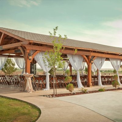 El Paso Wedding Pavilion (Options: 60' L x 30' W, Mature Redwood, 8-Post Anchor Kit for High-Wind, Transparent Premium Sealant). Photo Courtesy of Mr. & Ms. Rodriguez of El Paso Grace Gardens, 6701 Westside Dr. El Paso, Texas, 79932. We can build your Pavilion any size you need.