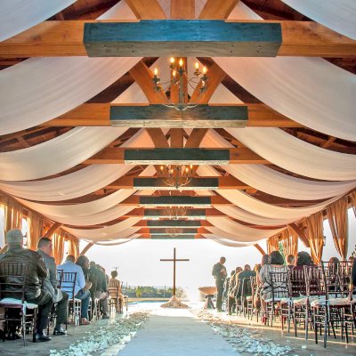 El Paso Wedding Pavilion (Options: 60' L x 30' W, Mature Redwood, 8-Post Anchor Kit for High-Wind, Transparent Premium Sealant). Photo Courtesy of Mr. & Ms. Rodriguez of El Paso Grace Gardens, 6701 Westside Dr. El Paso, Texas, 79932. We can build your Pavilion any size you need.