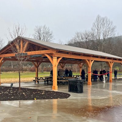 El Paso Wedding Pavilion (Options: 60' L x 30' W, Douglas-Fir, Post Anchor Kit for High-Wind, 10x10 Posts, 10.5' H Posts, Electrical Wiring Trim Kit for 2 Posts, No Ceiling Fan Bases, with Fascia Boards, With Horizontal Post Decorative Trims, Transparent Premium Sealant). Photo Courtesy of M. Flanagan of Norwich, NY.