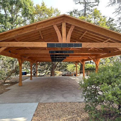 El Paso Wedding Pavilion (Options: 52'-7" x 26'-7", Douglas-Fir, 8-Post Anchor Kit for High-Wind, 8x8 Posts, 10' H Posts, Electrical Wiring Trim Kit for 4 Posts, with Ceiling Fan Base, with Fascia Boards, Transparent Premium Sealant). Photo Courtesy of J. Cooper of Oakland, CA.
