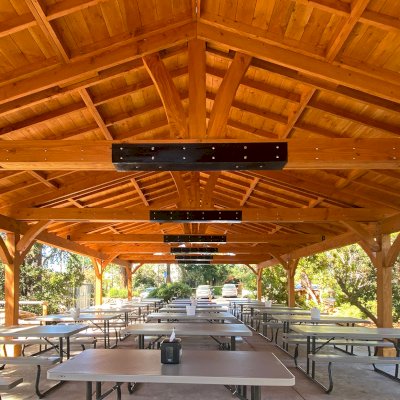 El Paso Wedding Pavilion (Options: 52'-7" x 26'-7", Douglas-Fir, 8-Post Anchor Kit for High-Wind, 8x8 Posts, 10' H Posts, Electrical Wiring Trim Kit for 4 Posts, with Ceiling Fan Base, with Fascia Boards, Transparent Premium Sealant). Photo Courtesy of Jennifer Cooper, Oakland Day School.