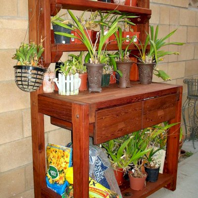 Eli's Redwood Potting Bench (Options: Standard Size, Old-Growth Redwood, No Casters, Two Shelves, No Fold Down Sides, No Copper Inset, No Engraving, No Removable Lid, Transparent Premium Sealant). Maybe needs a second one...