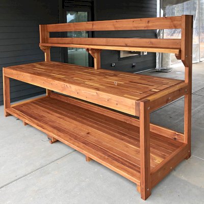 Custom Eli's Redwood Potting Bench (Options: 10' L x 36" W [Custom size], California Redwood, No Casters, One Shelf, No Drawers, No Fold Down Sides, No Engraving, No Lids, Transparent Premium Sealant). Photo Courtesy of B. Shanks of Salem, OR.