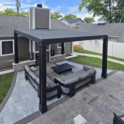 Emma's Modern Pavilion (Options: 12' x 14', No Privacy Panel, California Redwood, 9' H, Back Posts Wrapped in Masonry, 4 Electrical Wiring Trims, Vertical Post Decorative Trims, 1 Ceiling Fan Base, No Curtain Rods, Custom Finish [Wood Treatment Valhalla]). Photo Courtesy of P. Praxmarer of Chicago, IL.