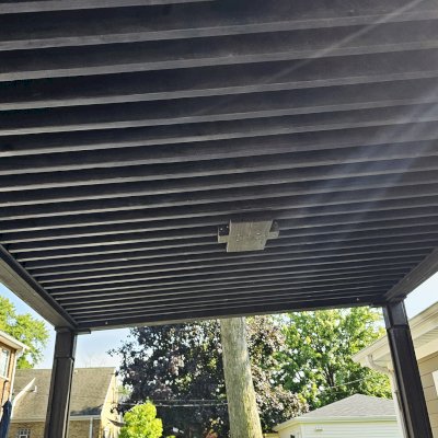 Emma's Modern Pavilion (Options: 12' x 14', No Privacy Panel, California Redwood, 9' H, Back Posts Wrapped in Masonry, 4 Electrical Wiring Trims, Vertical Post Decorative Trims, 1 Ceiling Fan Base, No Curtain Rods, Custom Finish [Wood Treatment Valhalla]). Photo Courtesy of P. Praxmarer of Chicago, IL.