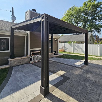 Emma's Modern Pavilion (Options: 12' x 14', No Privacy Panel, California Redwood, 9' H, Back Posts Wrapped in Masonry, 4 Electrical Wiring Trims, Vertical Post Decorative Trims, 1 Ceiling Fan Base, No Curtain Rods, Custom Finish [Wood Treatment Valhalla]). Photo Courtesy of P. Praxmarer of Chicago, IL.