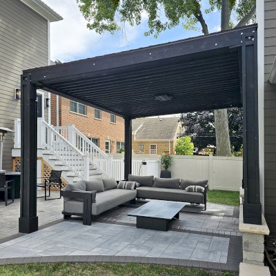 Emma's Modern Pavilion (Options: 12' x 14', No Privacy Panel, California Redwood, 9' H, Back Posts Wrapped in Masonry, 4 Electrical Wiring Trims, Vertical Post Decorative Trims, 1 Ceiling Fan Base, No Curtain Rods, Custom Finish [Wood Treatment Valhalla]). Photo Courtesy of P. Praxmarer of Chicago, IL.