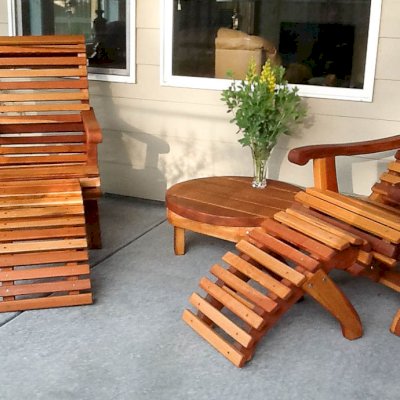 "some" customers just can't decide which way to use the ottomans! Ensenada Ottoman (Options: California Redwood, Transparent Premium Sealant). Photo also shows 2 Ensenada Easychairs and a Round Side Table. Photo Courtesy of Marilyn Brooks of Star, Idaho.