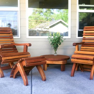 Ottomans placed in reverse by customer. They like it this way and we don't argue with our customers! Ensenada Ottoman (Options: California Redwood, Transparent Premium Sealant). Photo also shows 2 Ensenada Easychairs and a Round Side Table. Photo Courtesy of Mari.